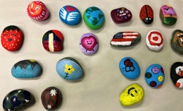 Photo of 20 colored painted rocks to be placed with Peace Pole in Poet's Corner on ֱ campus